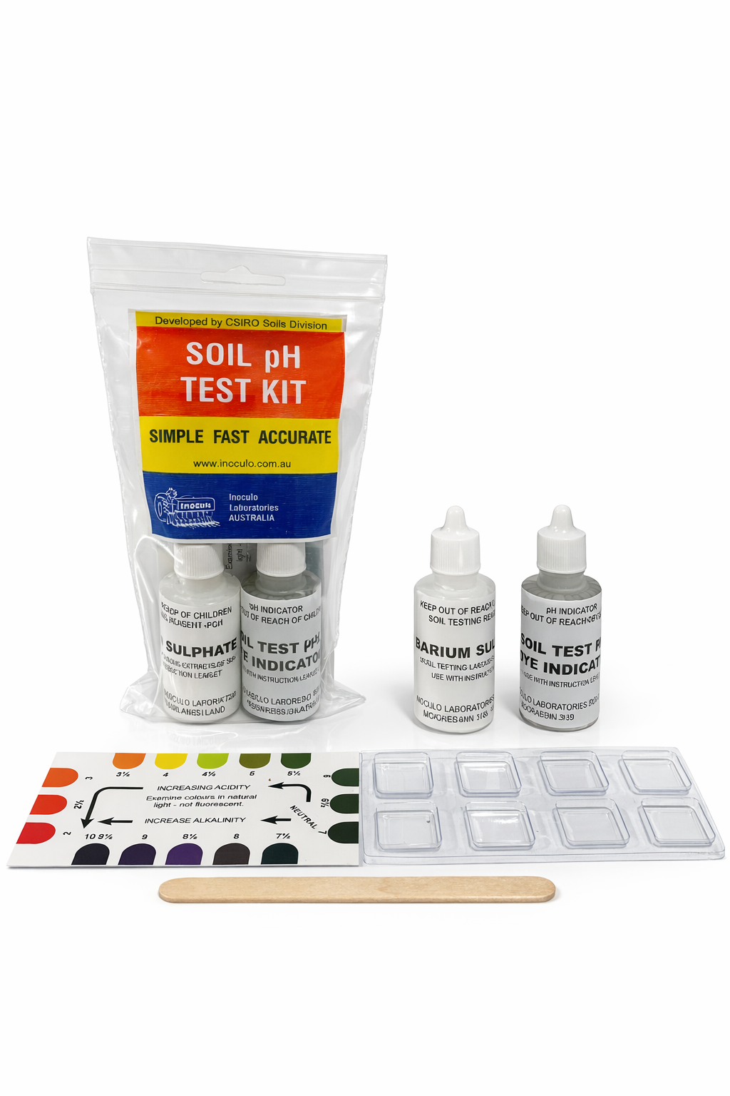 Soil pH test kit with bottles, indicator, and color chart on a white background